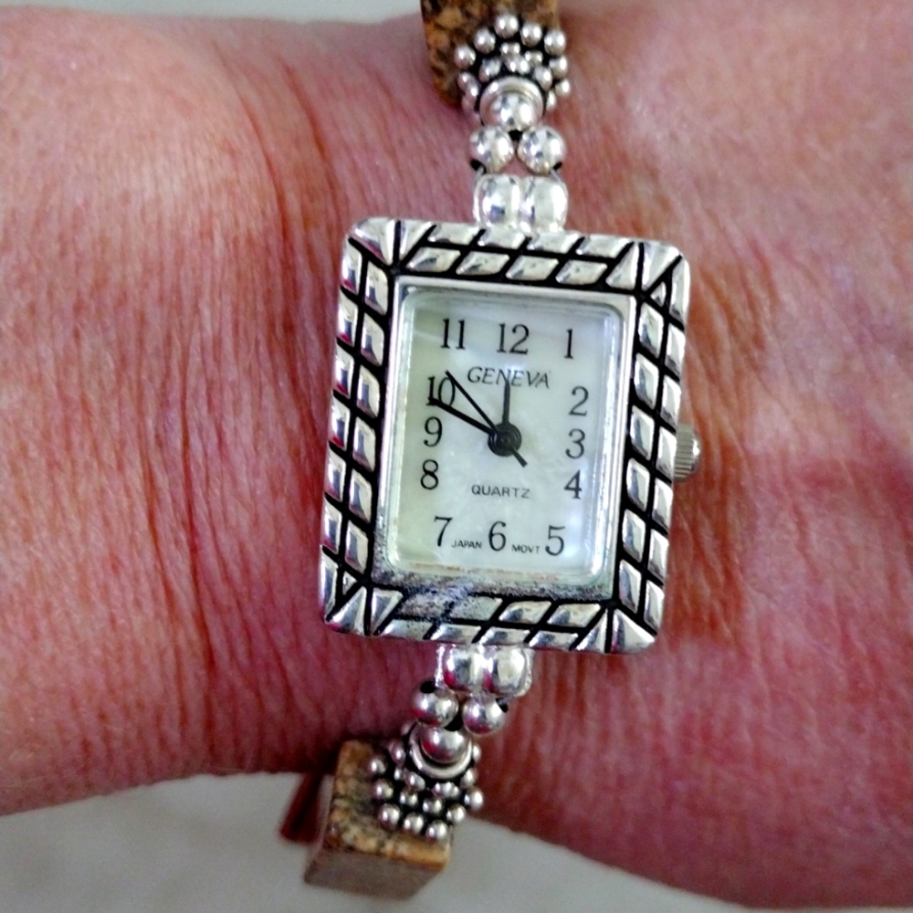 Geneva quartz watch.